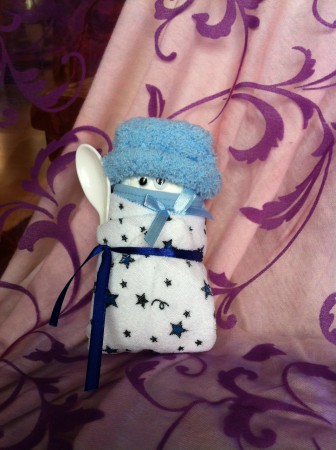 Luier,sokjes en een spugdoekje +lepel